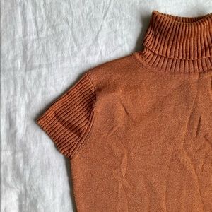 Burnt yellow shimmering short sleeve turtleneck